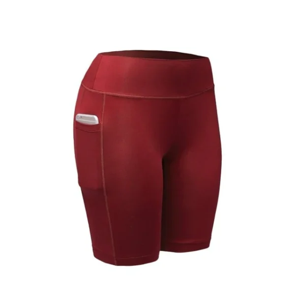 A red pair of shorts with pockets on the side.