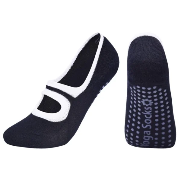 A pair of black and white shoes with the sole in the shape of a shoe.