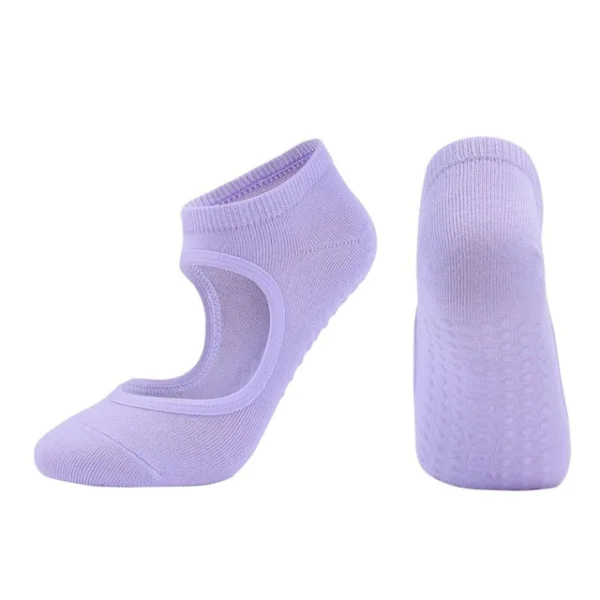 A pair of purple socks with a strap around the ankle.