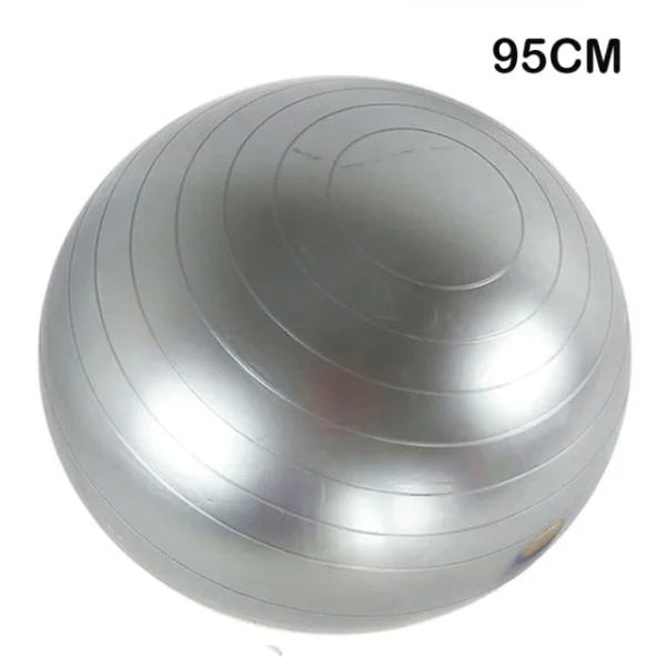 A silver ball sitting on top of a white floor.