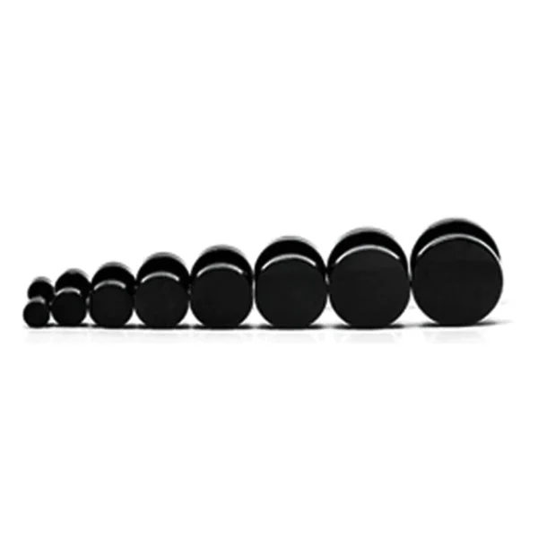 A line of black plugs lined up in a row.